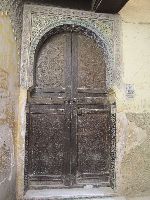 Door of Riad (Garden house) in the medina, Fez, Morocco