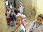 Children in narrow street in the medina, Fez, Morocco