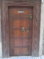 Door of Riad (Garden house) in the medina, Fez, Morocco