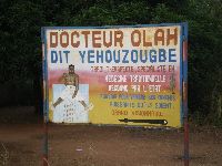 Comé, Benin, national highway, sign for traditional healer