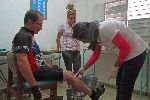 Cleaning road-rash, Family doctor clinic, Cuba