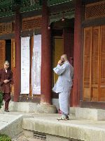 monk on cell phone, Woljeongsa